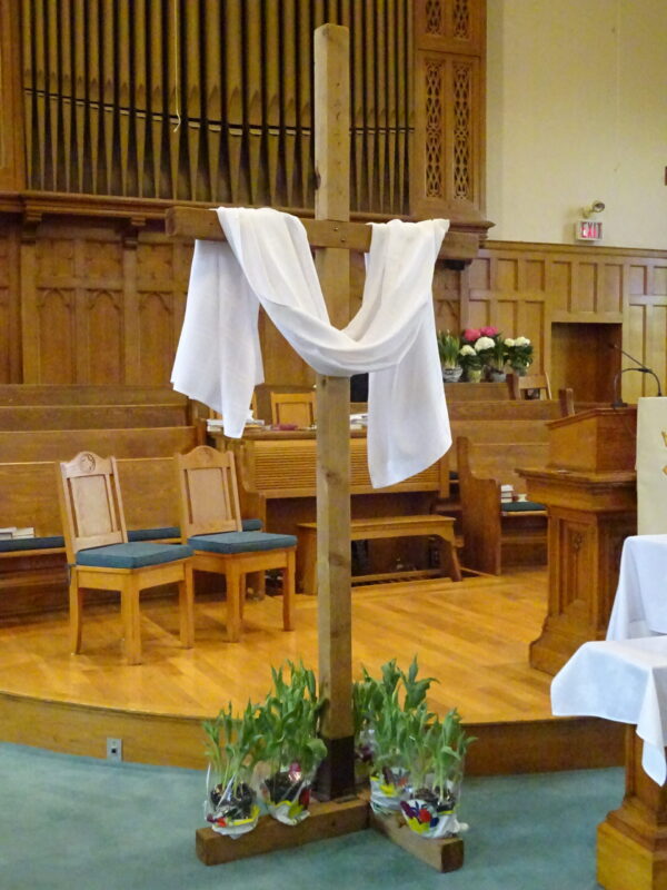 white stole draped on a cross